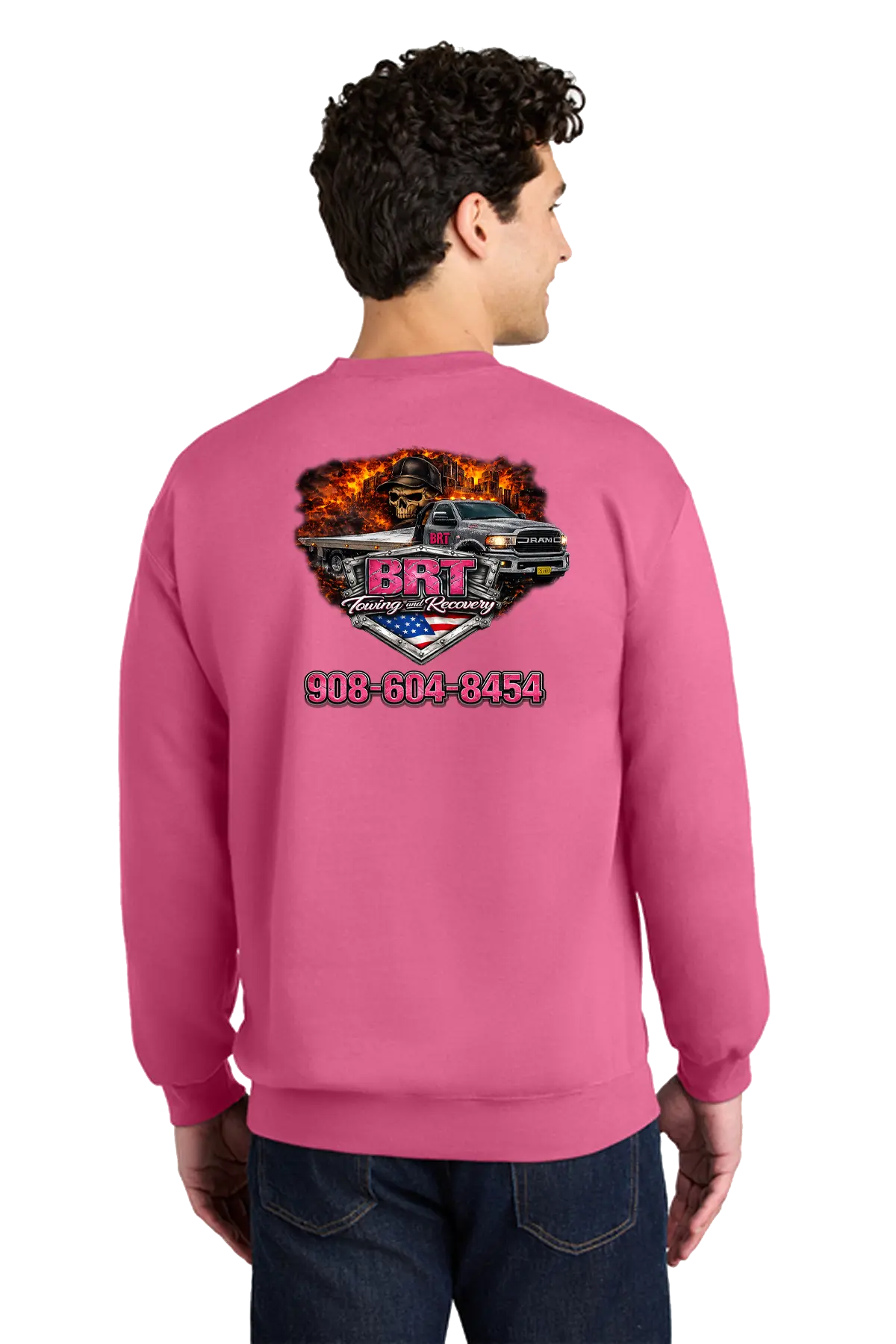 Person wearing a pink sweatshirt with a graphic design and contact information on the back. BRT Towing and Recovery, Paper Street Print Co, Blairstown, NJ.