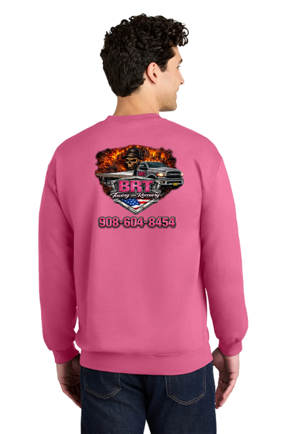Person wearing a pink sweatshirt with a graphic design and contact information on the back. BRT Towing and Recovery, Paper Street Print Co, Blairstown, NJ.