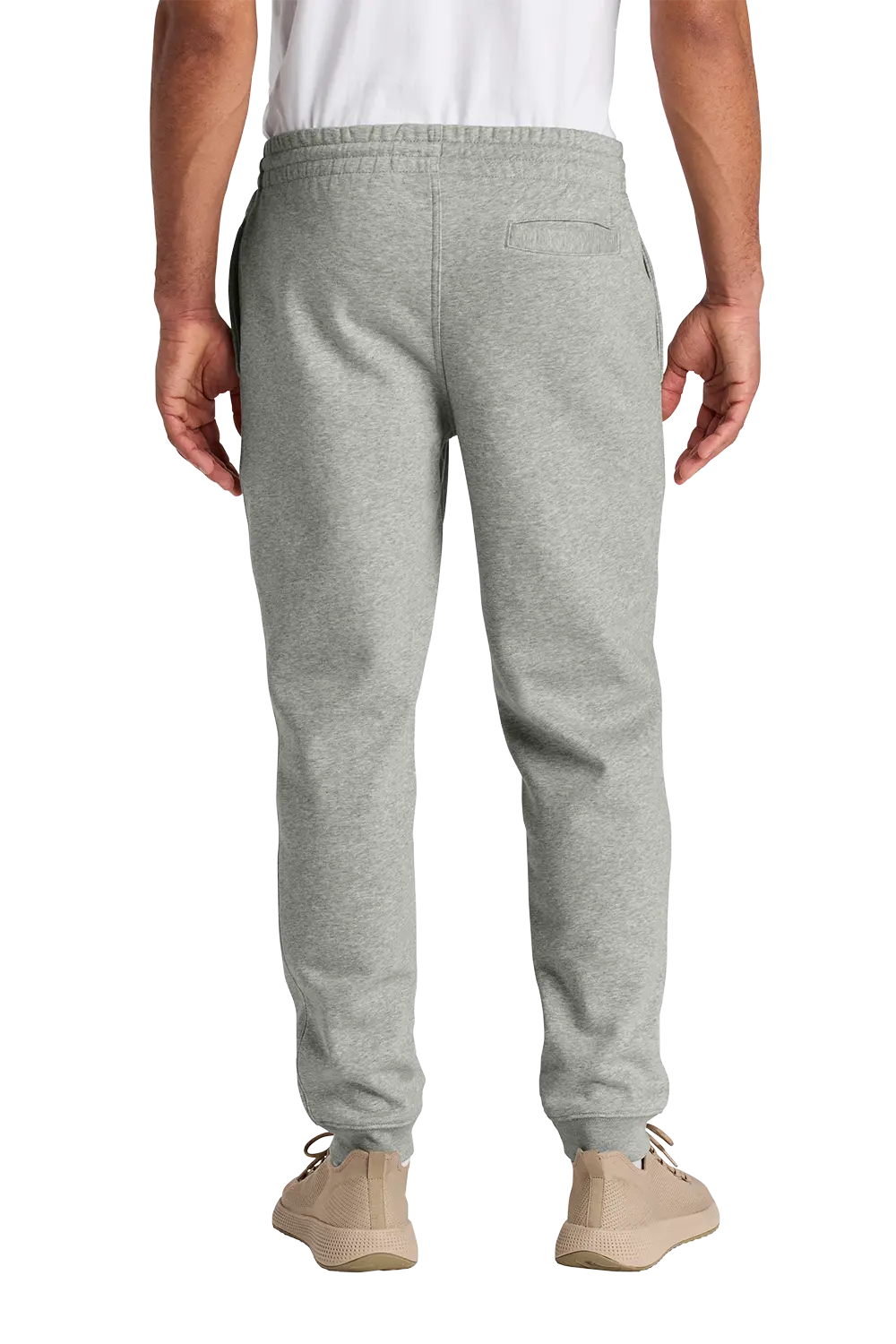 A person shown from the back wearing light heather gray sweatpants, a white shirt, and beige sneakers against a plain white studio background. HG Show Horses, Paper Street Print Co, Blairstown, NJ.