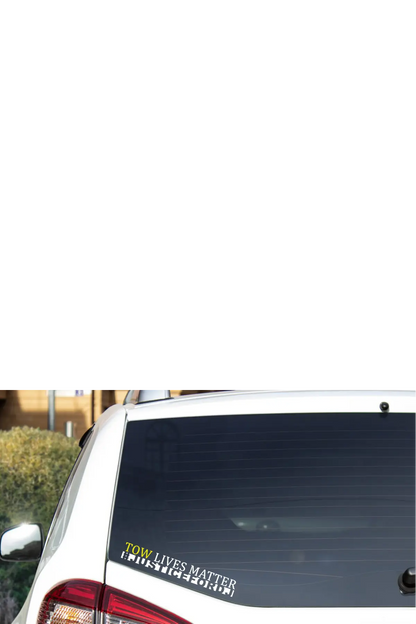 Car with a decal on the back window, featuring text saying TOW LIVES MATTER - JUSTICE FOR DJ - Paper Street Print Co, Blairstown, NJ.